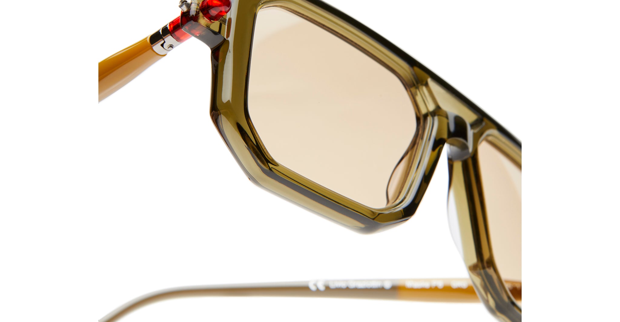 Right Lens Detail View of Kuboraum P8 Sunglass in Color GRG Military Green