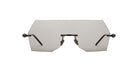 The Kuboraum P90 features a rimless design with large, geometric tinted lenses and thin black arms, shown against a white background.