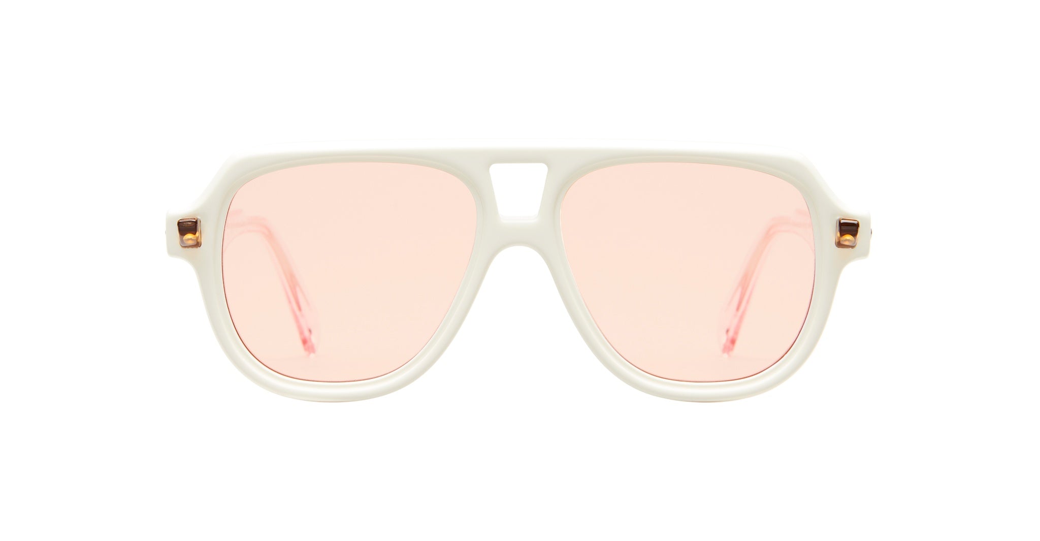 Front view of Kuboraum Q4 sunglasses featuring a white frame, wide bridge, and light pink tinted lenses, set against a plain white background.