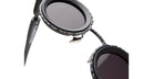 Close-up of KUBORAUM Z3 black round sunglasses featuring textured frame and dark lenses, viewed from the front.
