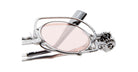 Close-up of Kuboraum Z50 metal steampunk-style eyeglasses with pink-tinted lenses, featuring intricate gears and mechanical details near the frames, and Kuboraum branding on the temple.