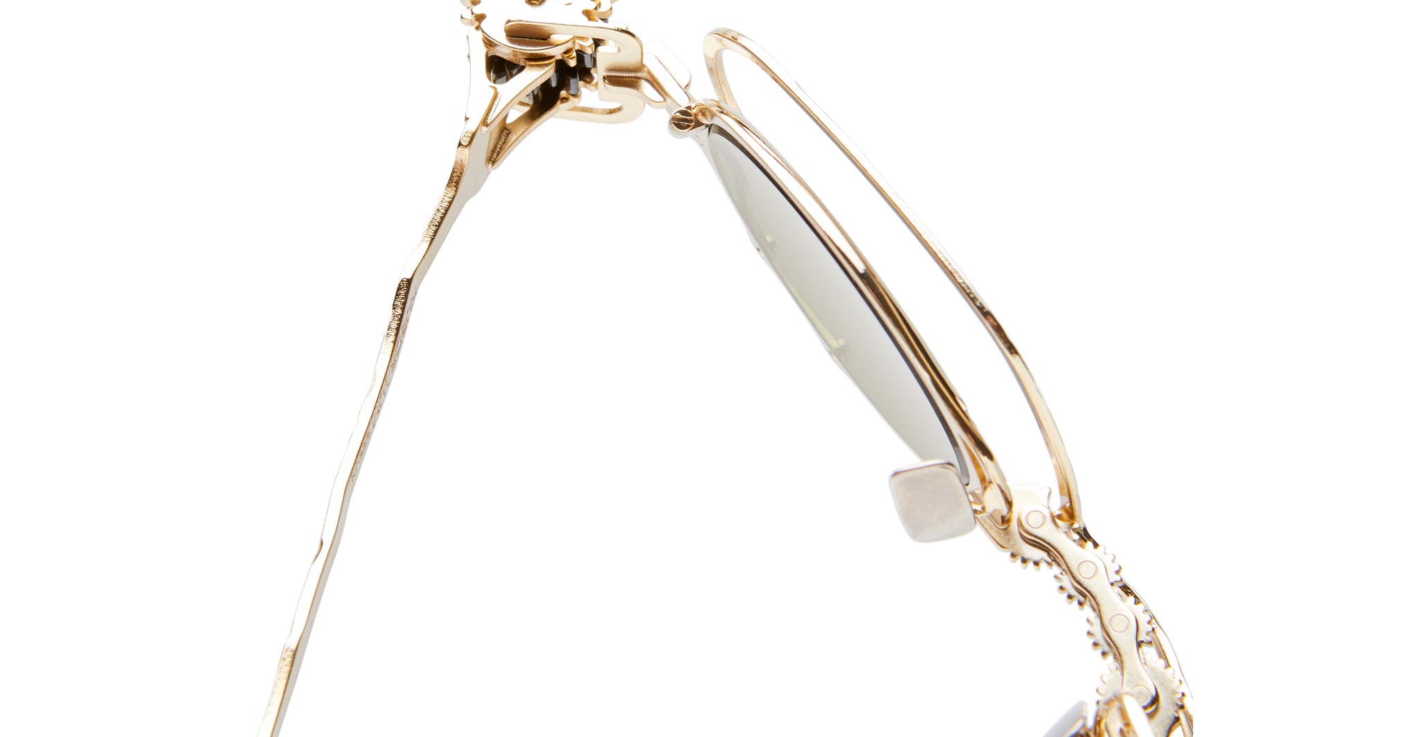 Close-up side view of KUBORAUM Kuboraum Z50 gold-rimmed round eyeglasses, showing frame details and model design.