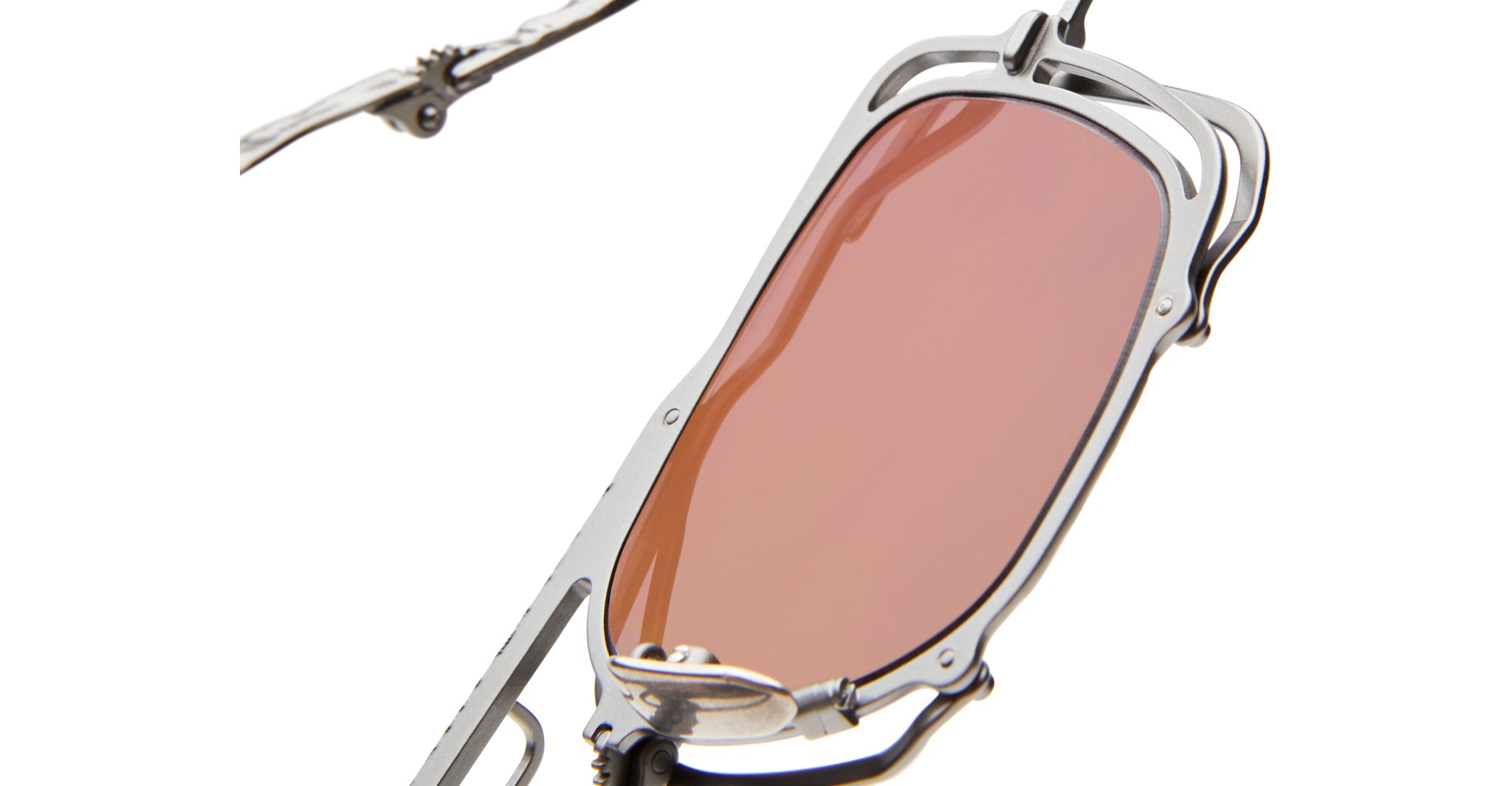 Close-up of KUBORAUM Z51 aviator sunglasses, featuring a silver metal frame and reddish tinted lenses, viewed from the front.