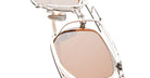 KUBORAUM Z51 sunglasses close-up showing silver frame and light brown lenses, front angle.