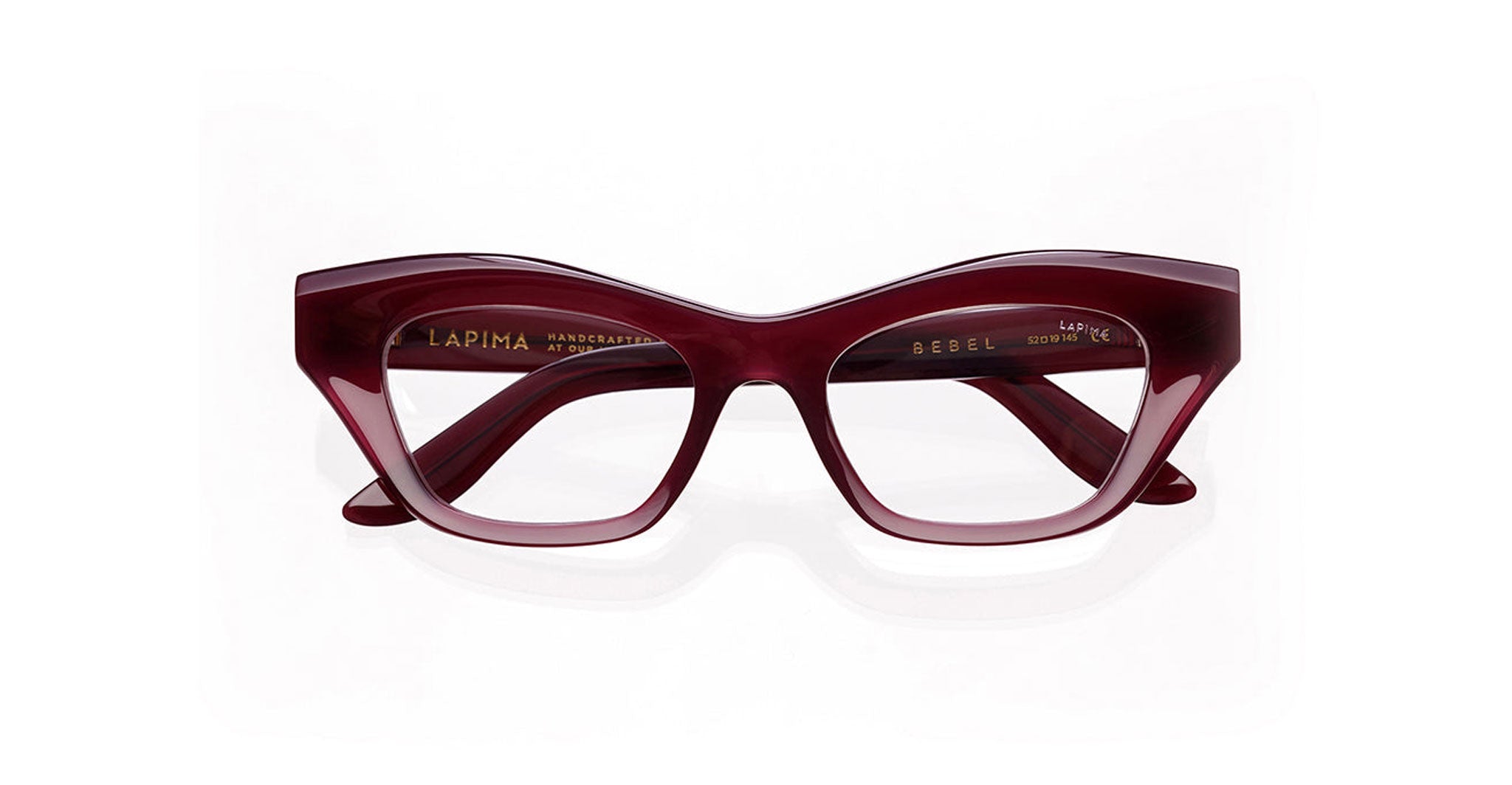 Burgundy, cat-eye eyeglasses with thick, glossy frames in Acai purple.