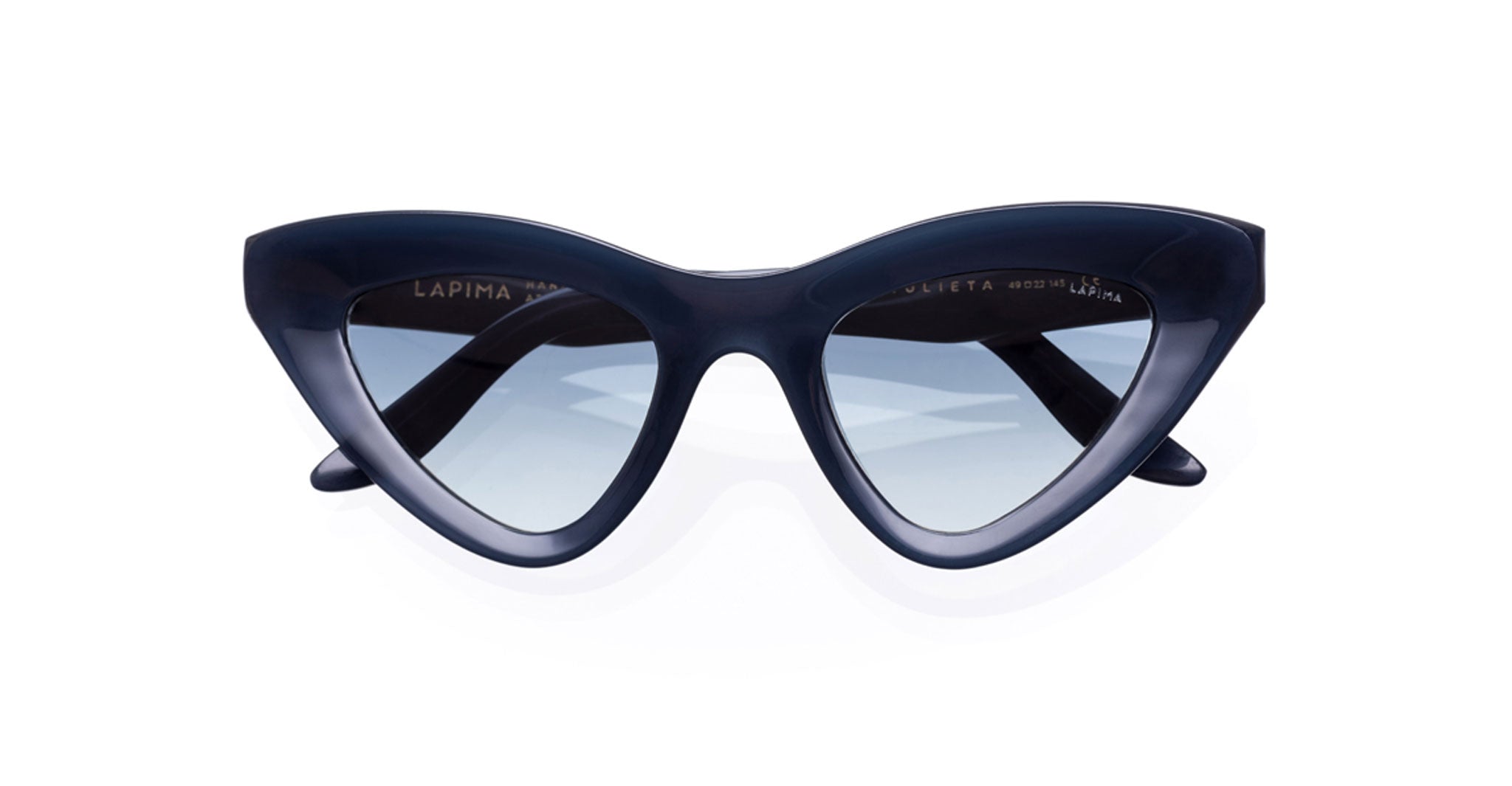 Lapima Julieta cat-eye sunglasses with dark blue frames and light tinted lenses, front view. Brand: Lapima. Model: Julieta.