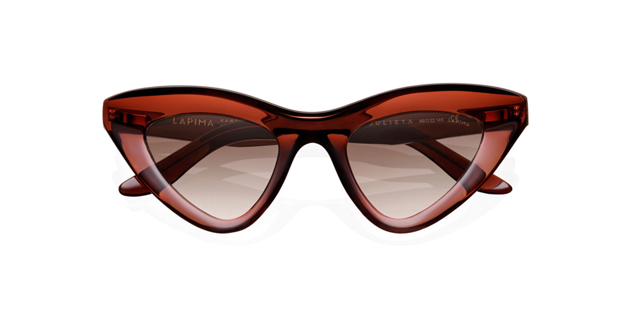 The Lapima Julieta features red cat-eye sunglasses with thick, glossy frames and brown gradient lenses, shown on a white background.