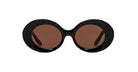Lapima Madalena sunglasses by Lapima, black round frames with thick rims and brown tinted lenses, shown from the front.