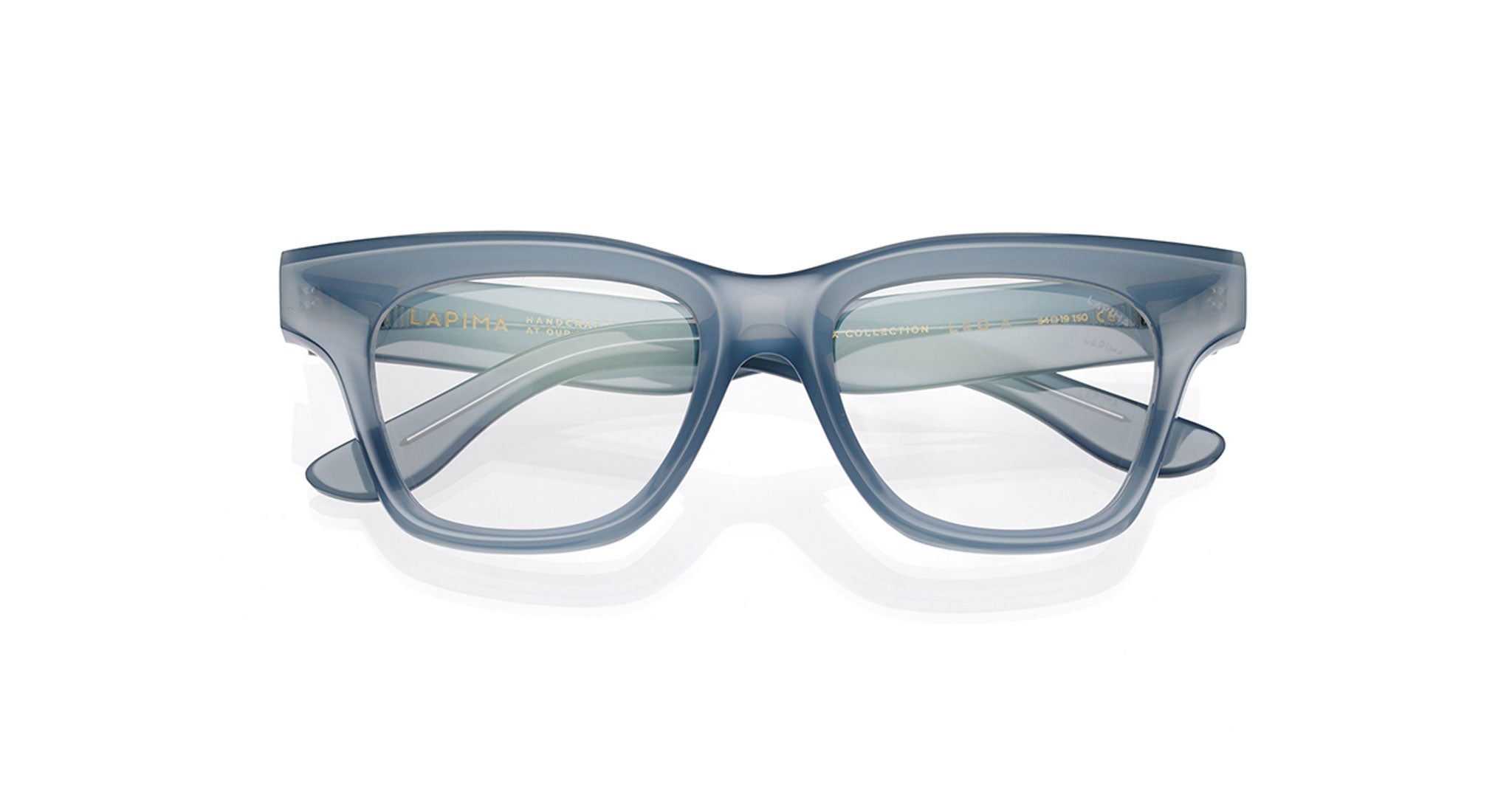 Lapima Leo X translucent blue unisex rectangular eyeglass frames, handcrafted from Italian acetate with thick optical frames and clear lenses, shown from the front against a white background.