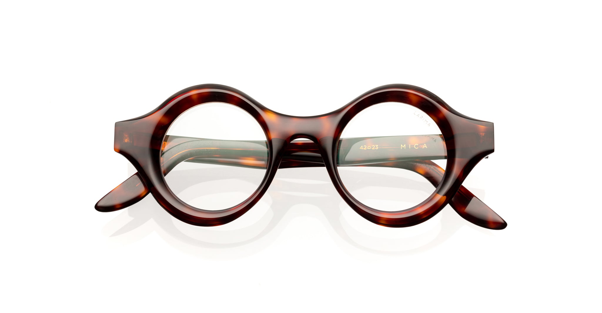 Lapima Mica round tortoiseshell eyeglasses with thick frames, front view. Brand: Lapima. Model: Mica. Eyeglasses.