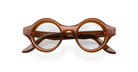 The Lapima Mica features round, thick brown acetate frames and clear lenses, shown from the front against a white background.