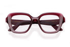 A pair of square, thick-framed eyeglasses in a deep burgundy color, viewed from the front. The inside of the left temple arm is printed with the brand name Lapima.
