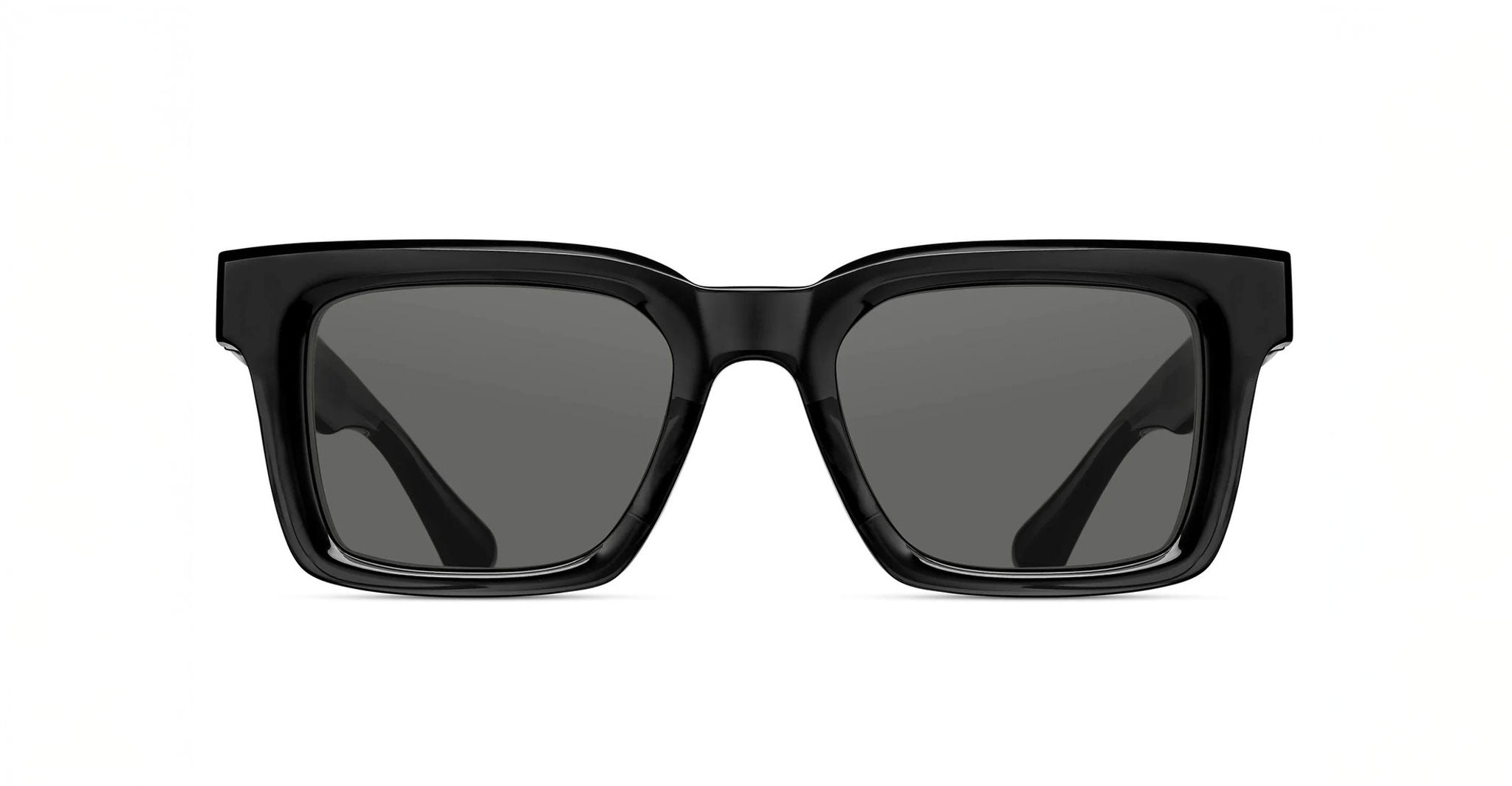 Matsuda M1033 black rectangular sunglasses feature thick, glossy frames and dark tinted lenses, shown against a plain white background.