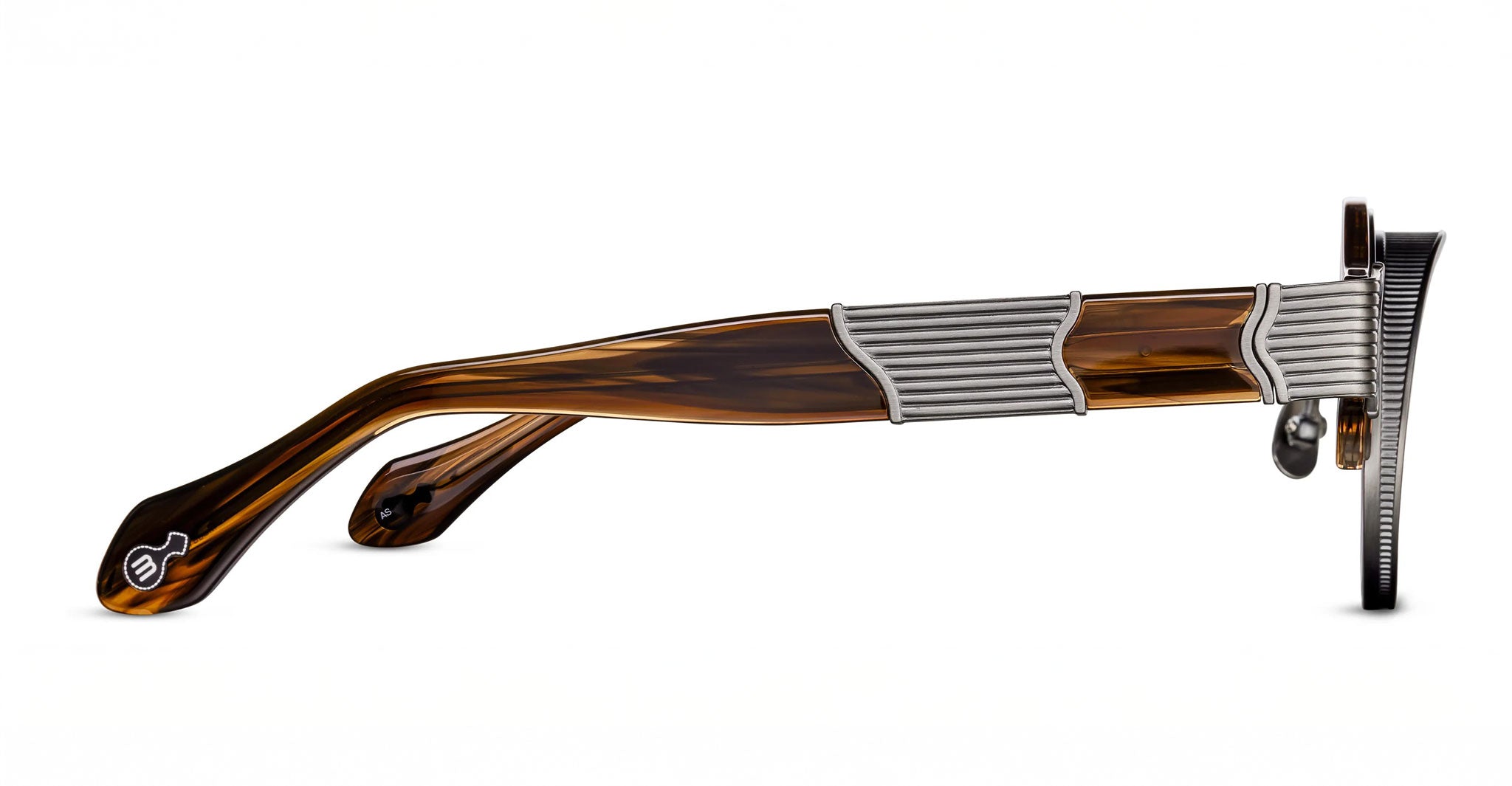 Side view of Matsuda 10605H brown tortoiseshell eyeglass frames featuring silver metal ribbed arm accents and a small white logo near the temple tip, set against a white background.