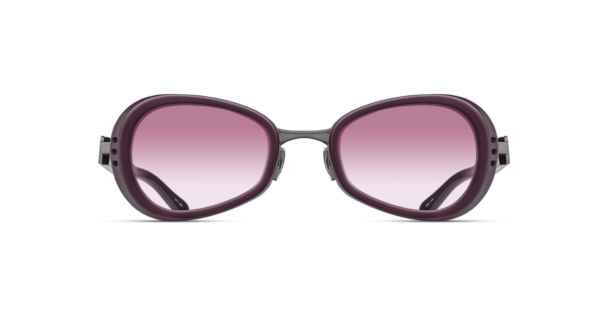 A pair of sunglasses with thick, dark purple frames and gradient pink lenses, shown from the front against a white background.