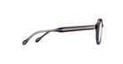 Side view of Matsuda M1032 eyeglasses featuring round lenses, a dark frame, detailed metal inlay on the arm, and small decorative gold symbols near the hinge and arm tip.