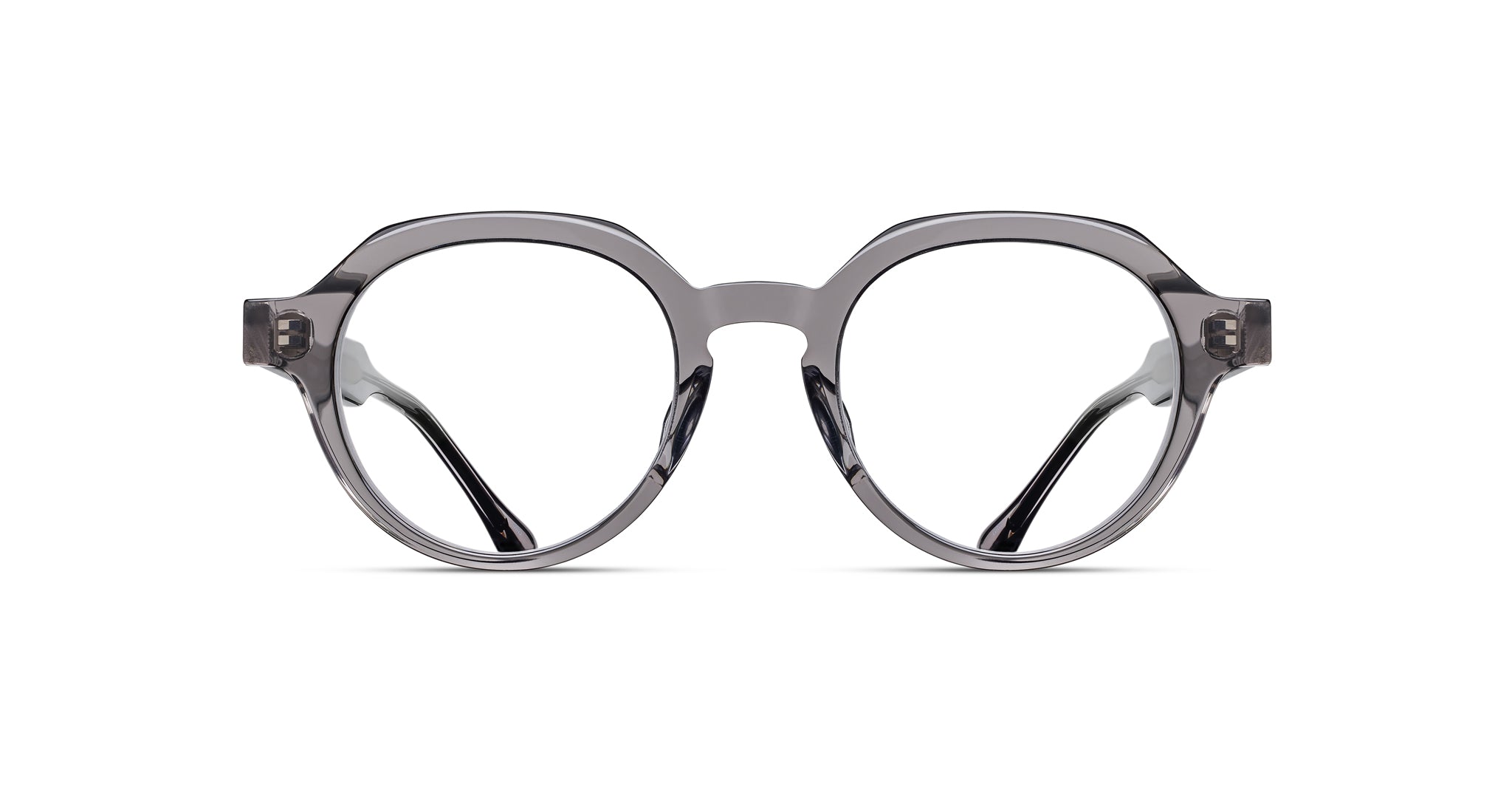 Front view of Matsuda M1032 clear gray eyeglass frames featuring round lenses and a keyhole bridge, displayed on a white background.