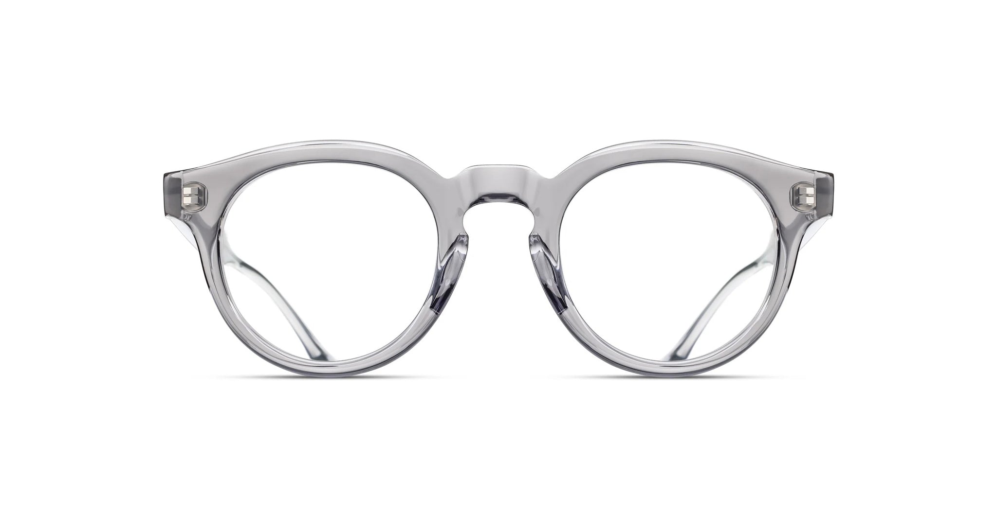 The Matsuda M1036 (Copy) features clear round eyeglass frames made from transparent plastic, shown from the front against a white background, highlighting their classic design.