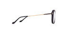 Side view of Matsuda M2062 eyeglasses with black round frames, thin gold arms, decorative accents by the hinges, clear lenses, and curved black temple tips.