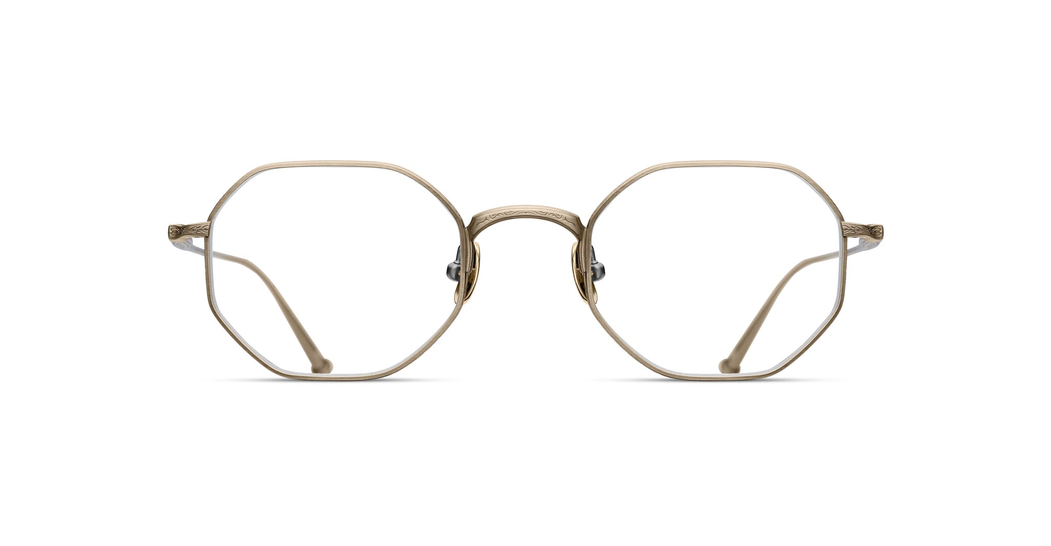 Matsuda M3086 eyeglasses with gold hexagonal frames and thin temples, front view.