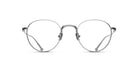 Matsuda M3085 optical frame in brushed silver, featuring a rounded P3-inspired silhouette with finely engraved metal rims, an intricately detailed bridge, adjustable nose pads, and slim titanium temples with sculpted tips.
