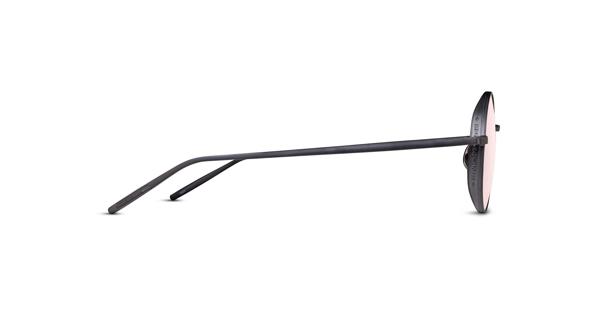 Side view of Matsuda M3087 eyeglasses featuring black round frames, slim arms, and a hinge attached to the circular lens frame, displayed against a white background.