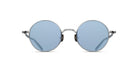 The Matsuda M3087 sunglasses feature round, thin silver metal frames and light blue tinted lenses, shown on a white background.