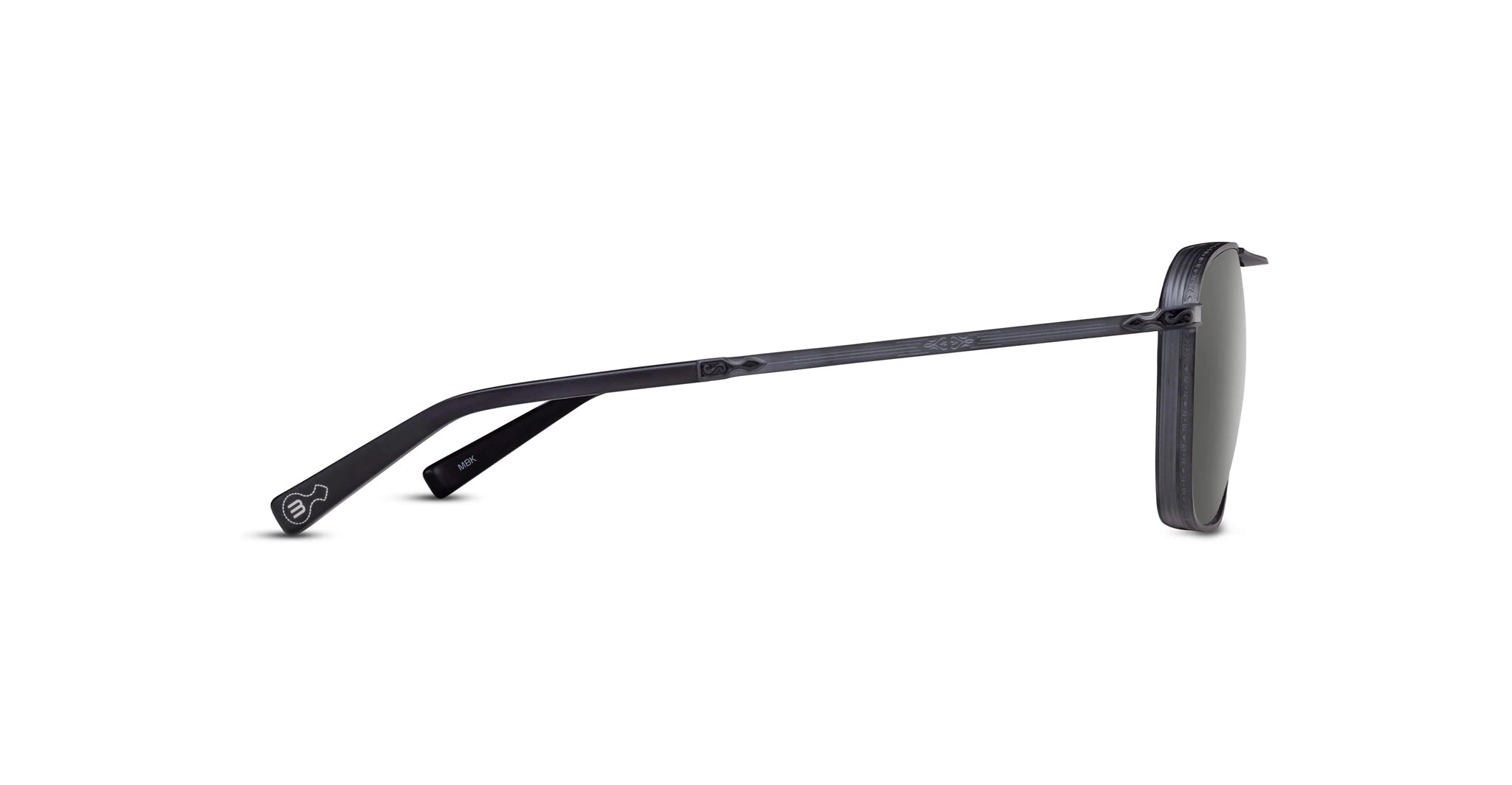 Side view of Matsuda M3135 black sunglasses with thin frames, dark lenses, extended arm, and a small white logo near the temple tip.