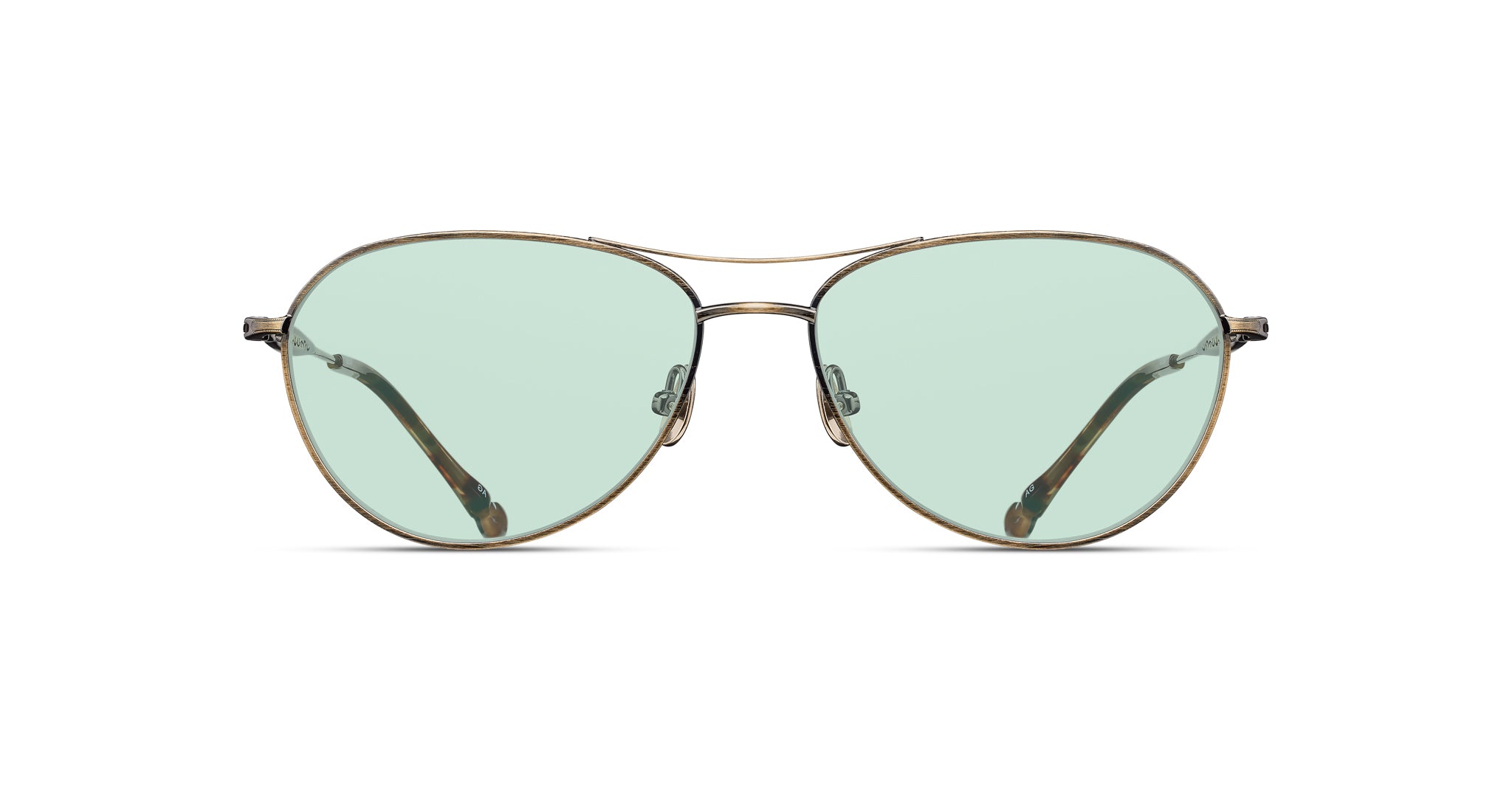 The Matsuda M3139 features aviator-style sunglasses with thin metal frames and light green-tinted lenses, displayed from the front on a white background.