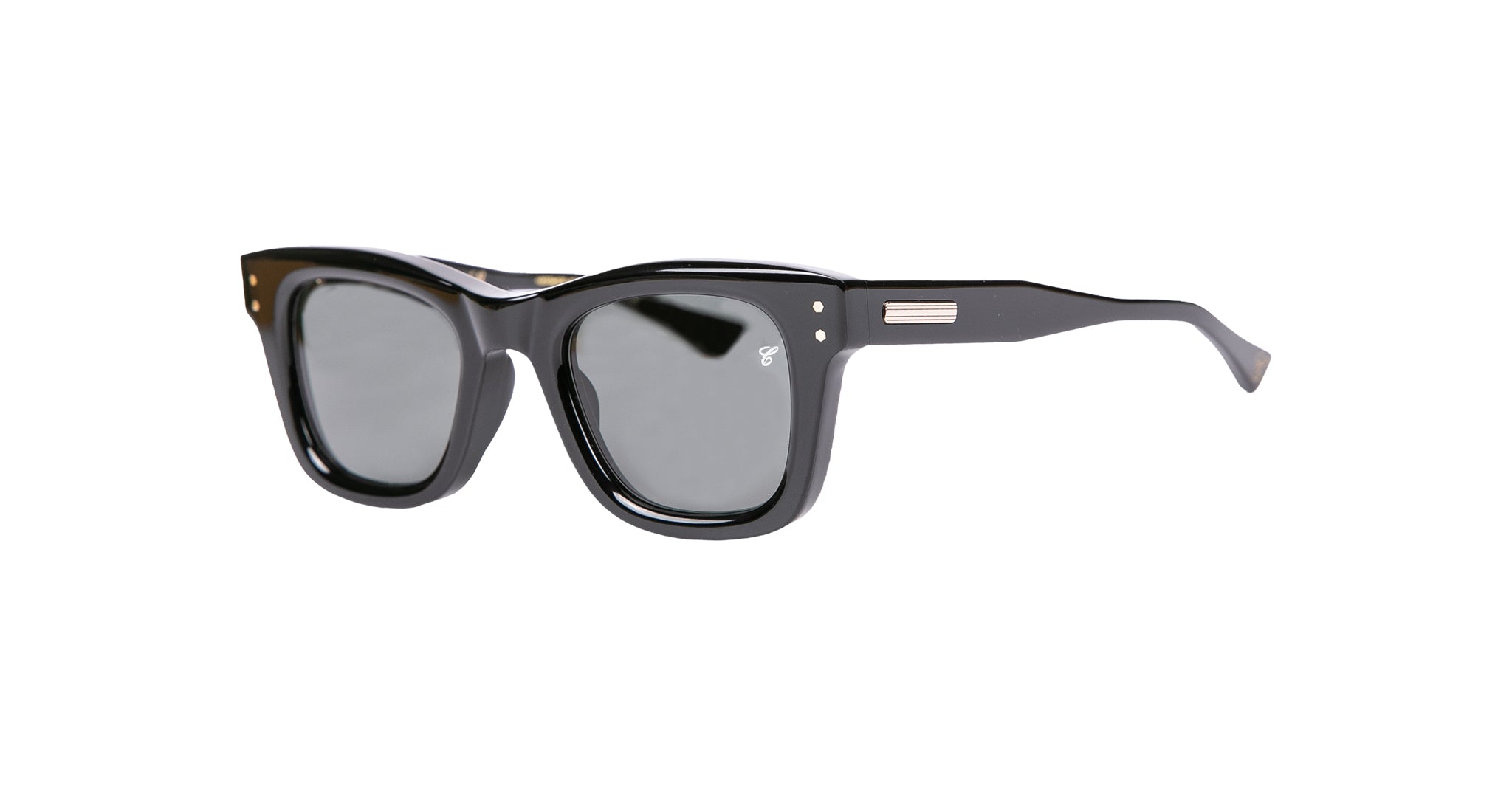 The Native Sons Casinola x Native Sons “The E’s” (The Eddie) sunglasses feature black, thick-framed Wellington-style Takiron acetate with dark lenses and silver temple accents, displayed against a white background.