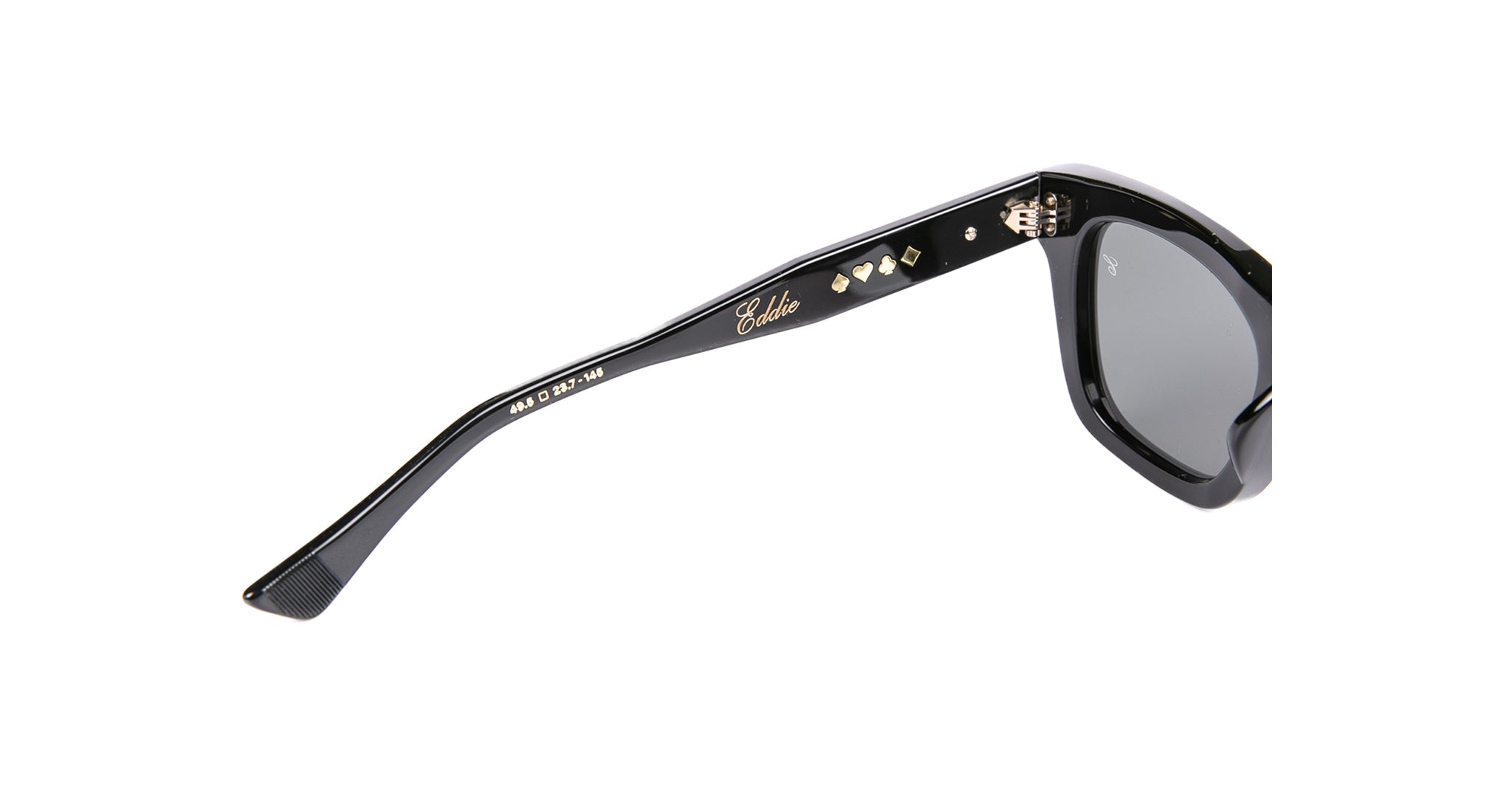 Close-up of the side of black Native Sons Casinola x Native Sons “The E’s” (The Eddie) acetate sunglasses, featuring gold decorative accents and Globe inscribed on the arm.
