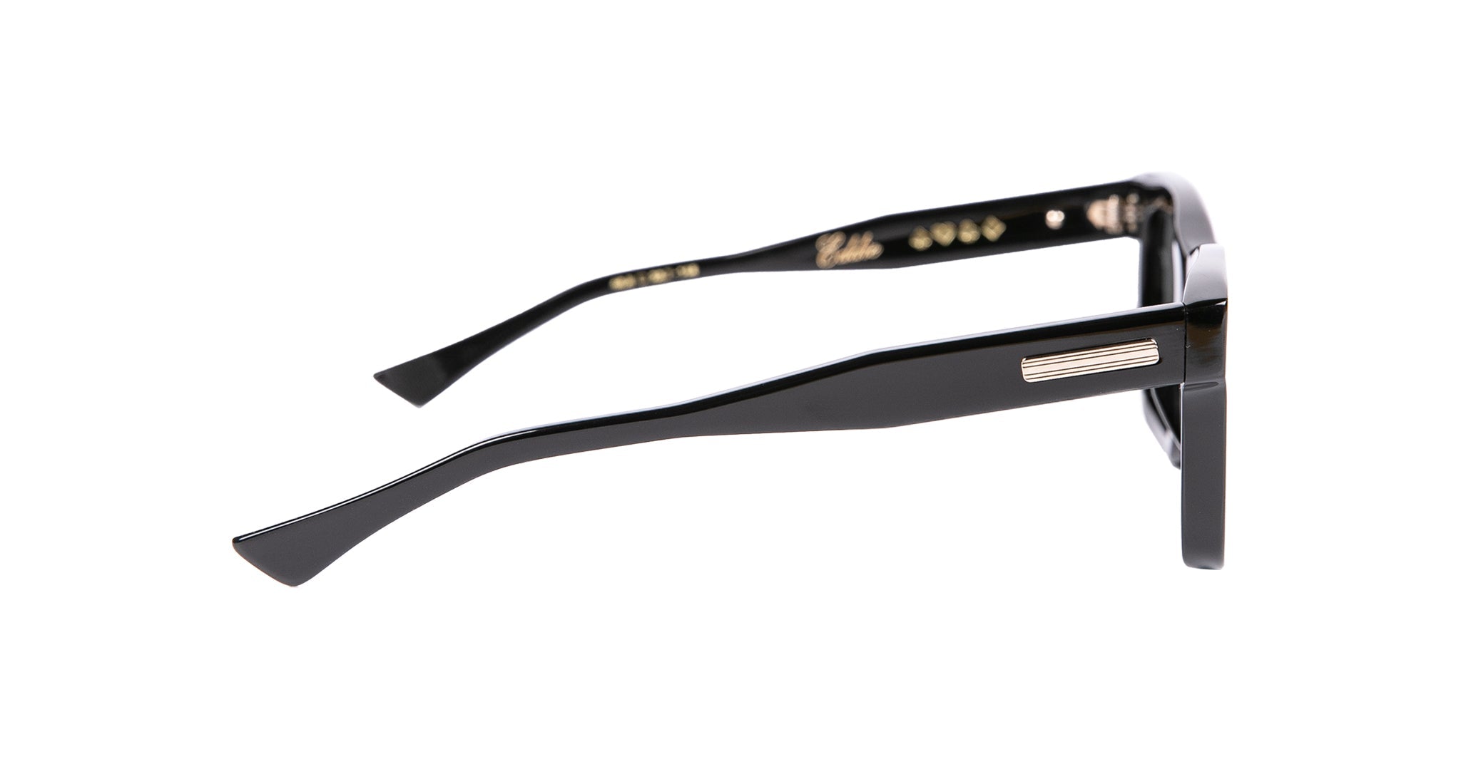 Side view of Casinola x Native Sons “The E’s” (The Eddie) black rectangular eyeglass frames, crafted from Takiron acetate with a silver rectangular detail on the arm, shown against a white background.