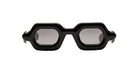 Paloceras Pebble SX sunglasses with glossy black frame and dark gray tinted lenses.