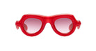 Red Aviator Paloceras Pebble sunglasses with a thick, rounded translucent frame and pink-tinted lenses