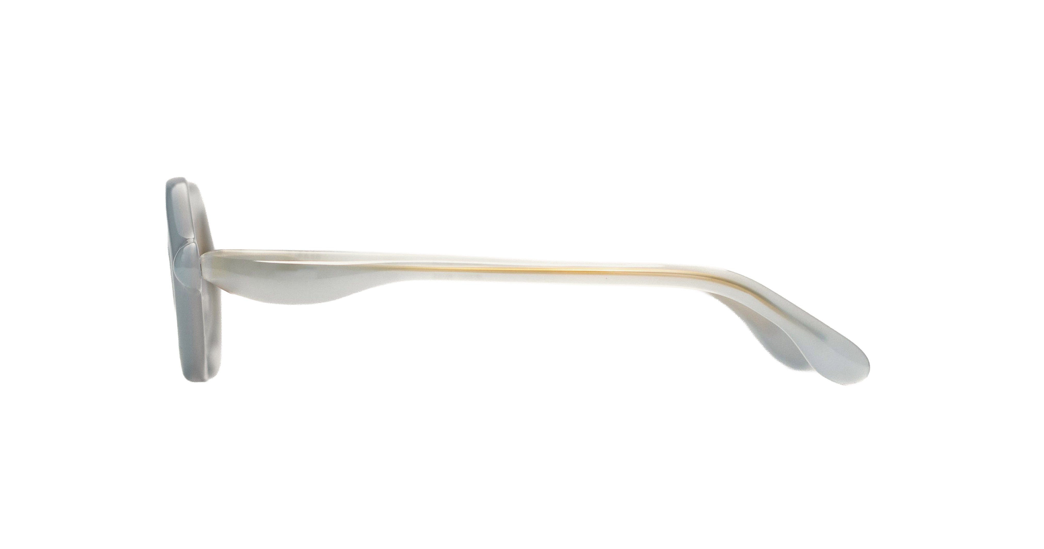 Paloceras Nouvelle Fiction R2 Milky Blue sunglasses in a pale translucent blue frame with thick rounded oval rims and warm golden gradient lenses, three-quarter view