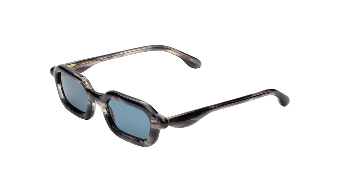 Paloceras S2 rectangular sunglasses in Night Nectar, translucent smoky purple-gray with blue lenses, angle view.