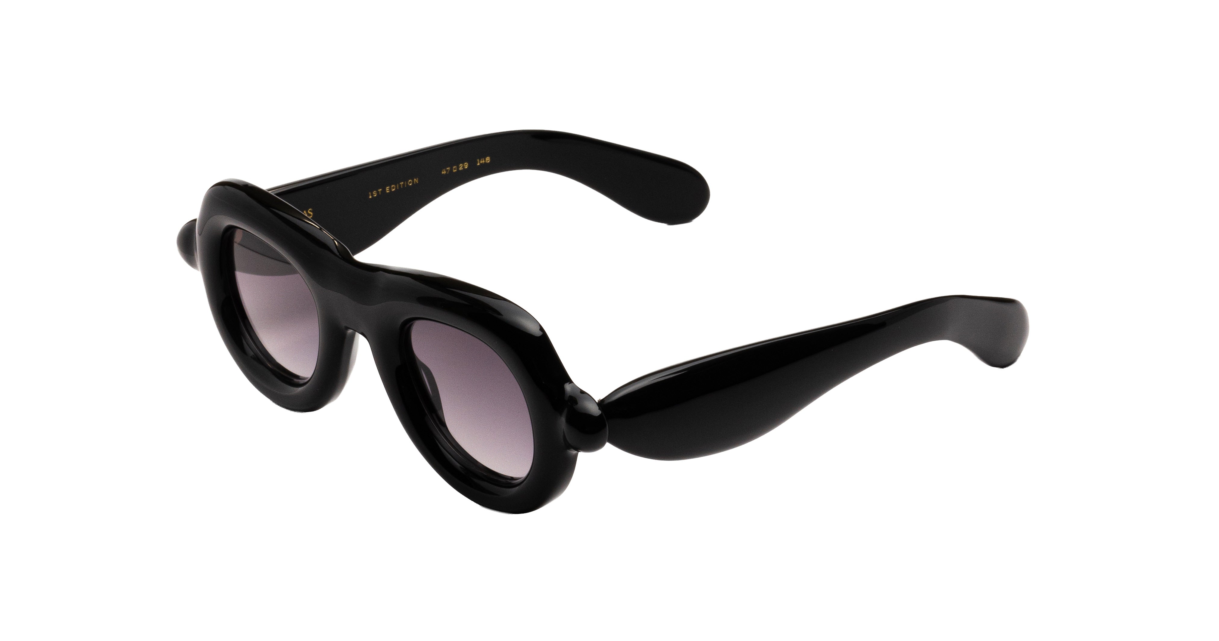 Paloceras black Pebble VX oversized aviator sunglasses with a thick, sculptural frame and gradient gray lenses, shown at an angle