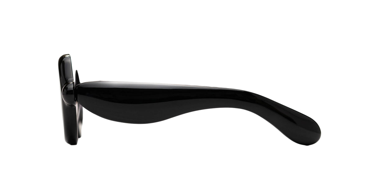 Side view of the Paloceras black Pebble VX oversized aviator sunglasses showing thick curvy voluminous temples.