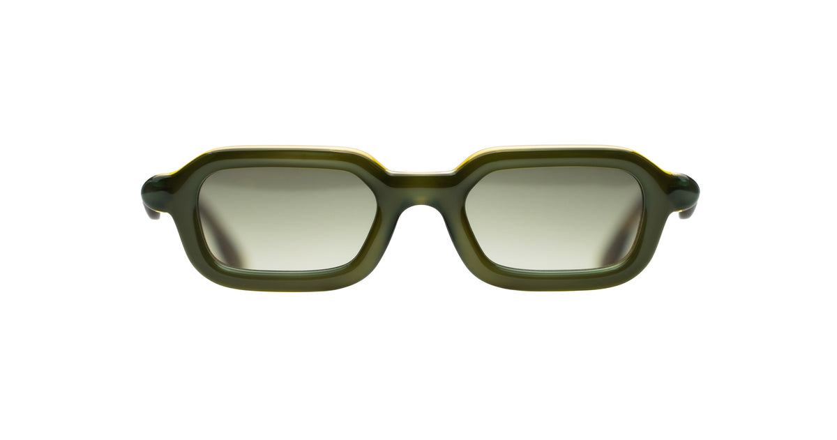 Paloceras Nouvelle Fiction S2 Wasabi Haze sunglasses in a translucent olive green frame with golden yellow highlights, softly rectangular rims, and pale green lenses, front view