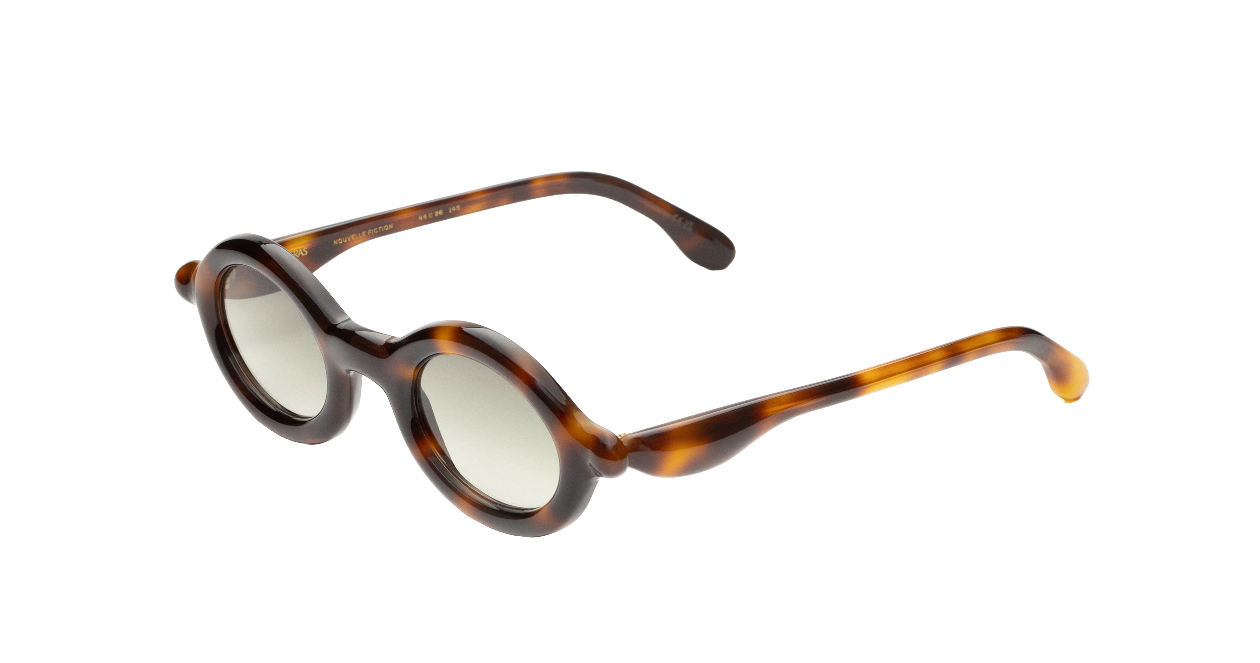 Paloceras Nouvelle Fiction R2 Havana Gold sunglasses in a dark brown tortoiseshell frame with warm amber highlights, rounded oval rims, and pale green lenses, three-quarter view