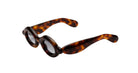 An angled view of the Paloceras RX model puffy looking sunglasses with gold havana coloring.