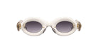 Paloceras Pebble RX Dulce Gloss sunglasses in a clear champagne frame with thick rounded oval rims, gray violet lenses, and gold-tone details, front view