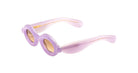 Paloceras Pebble RX Lilac Dream sunglasses with thick rounded rims and warm brown lenses, angled view