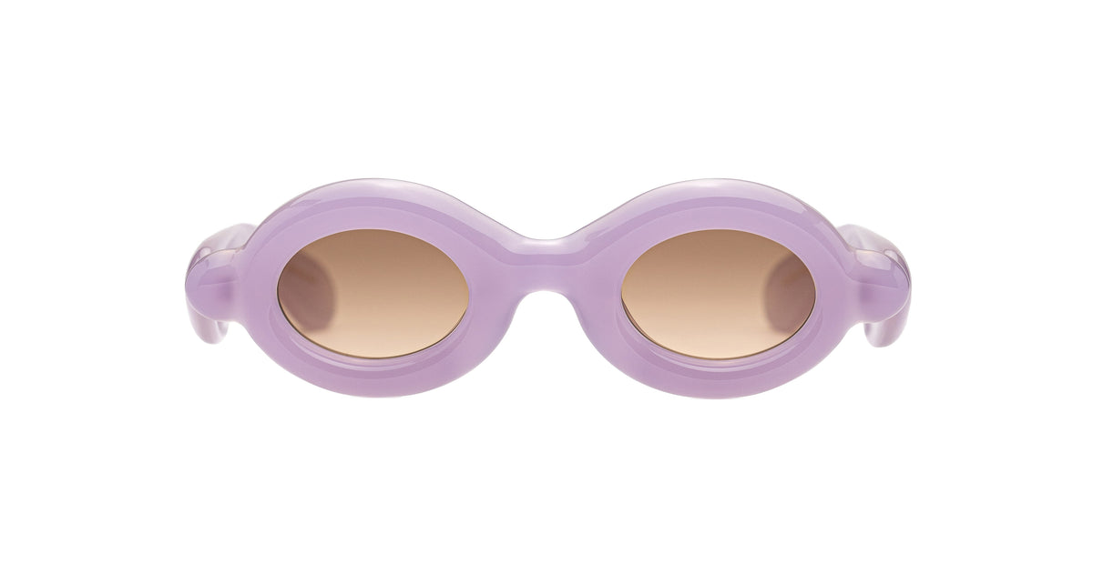 Paloceras Pebble RX Lilac Dream sunglasses with thick rounded rims and warm brown lenses, front view