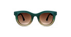 The Thierry Lasry Consistency sunglasses feature round frames with a thick green-to-beige gradient and brown-tinted lenses, displayed front-facing on a white background.