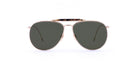 Thom Browne 015 aviator sunglasses, gold frames, dark lenses, front angle view.