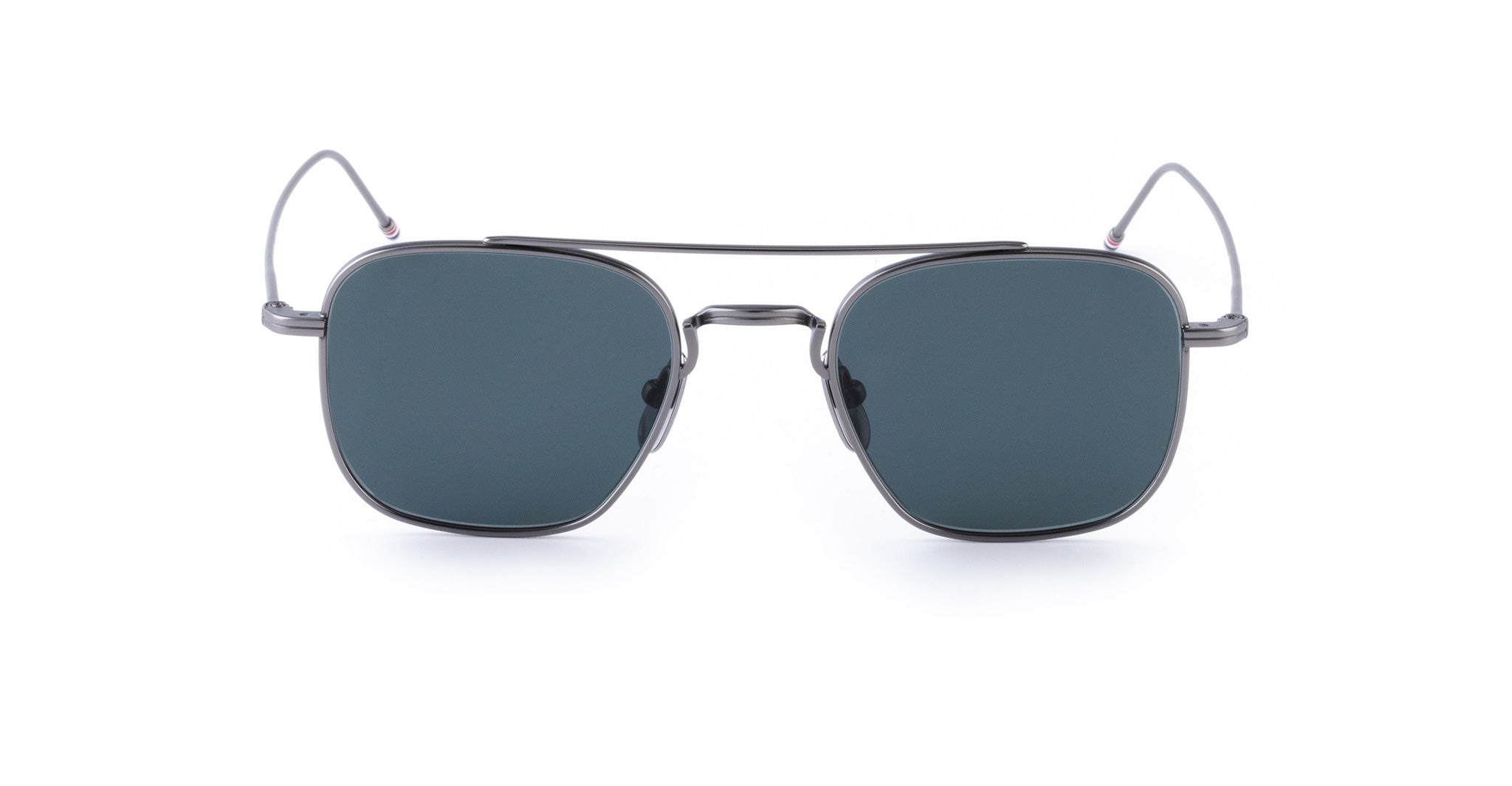 Front view of Thom Browne 907 square sunglasses featuring a thin metal frame and dark UV lenses.