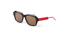 A pair of rectangular Thom Browne sunglasses with a black front frame, brown-tinted lenses, white temples, and red earpieces, placed on a white background.