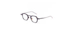 The Thom Browne 930 features black, rectangular eyeglasses with thin arms and clear lenses, shown on a white background.