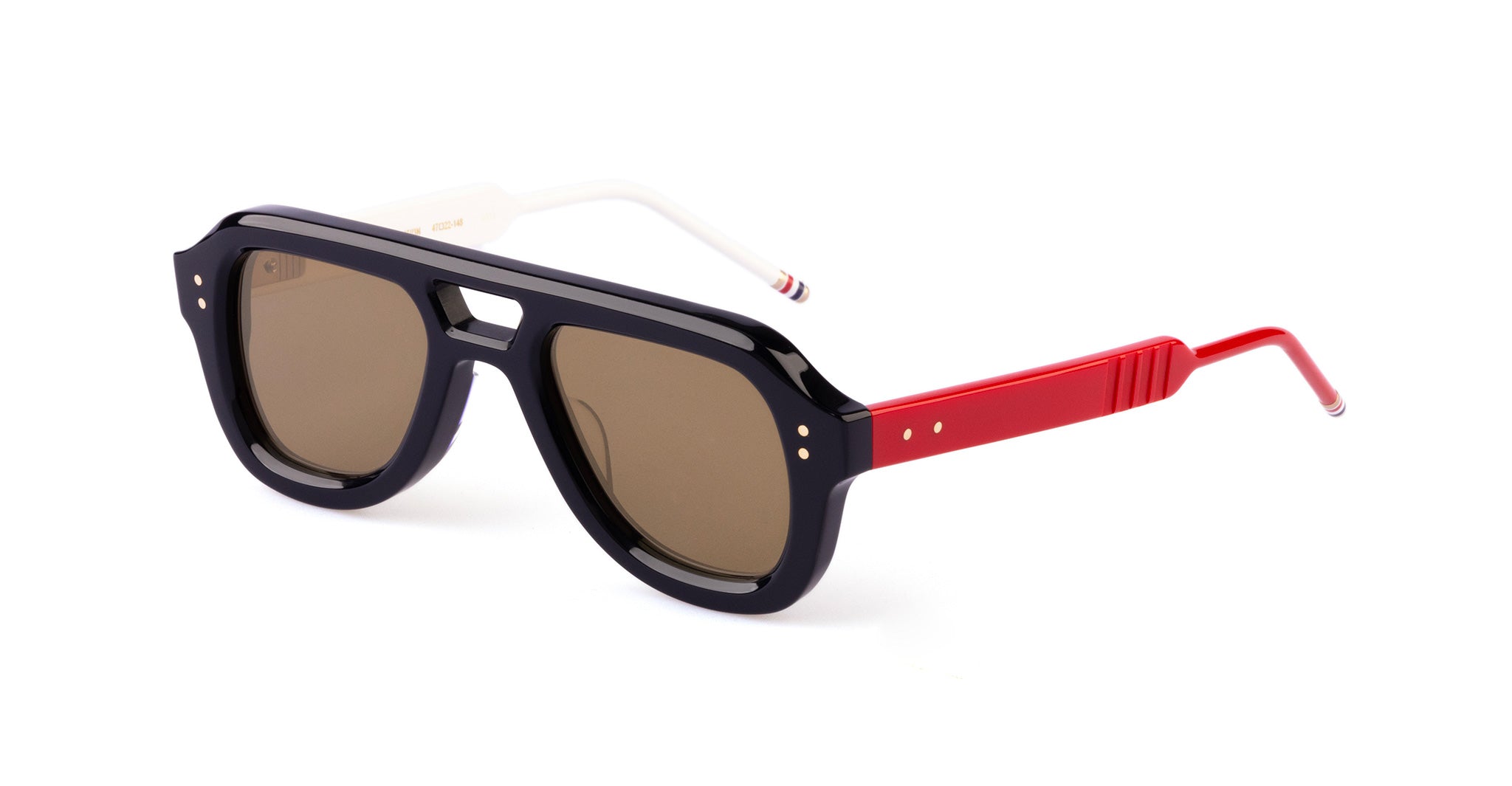 Pair of aviator sunglasses with brown lenses, a thick black frame, and red and white arms; the left arm is mostly red while the right arm is mostly white with small colored stripes at the ends.